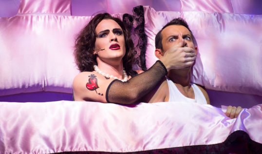 Tender is the night... Oliver Thornton as Frank'n'Furter with Sam Attwater as Brad. Production photography: Manuel Harlan