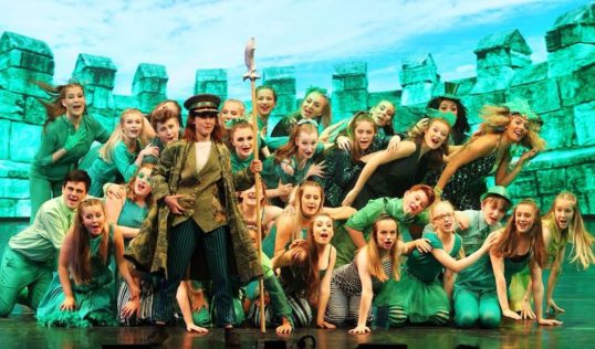Clare Wootton (Emerald City Guard) and Ozians. Pic Beyond Broadway Productions