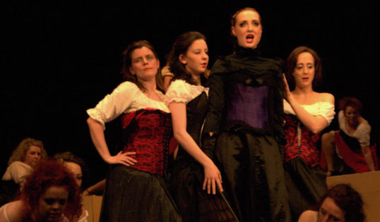 Bring on the Men: The Red Rat Girls - with Spider (Judith Neeson) in purple. Photo The Bohemians.jpg