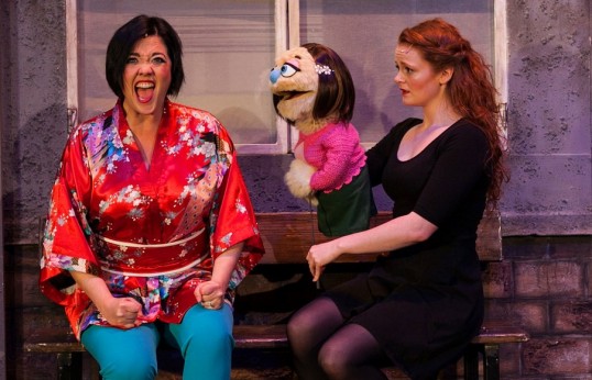 Jacqueline Tate as Christmas Eve and Lucie-Mae Sumner as Kate Monter in Avenue Q. Photo Credit Darren Bell