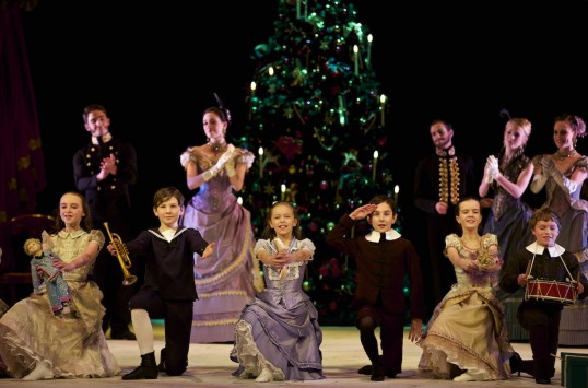 Amy Pollock as Clara, Jamie Campbell as Fritz with Party Children in Peter Darrell’s The Nutcracker. Photo by Andy Ross