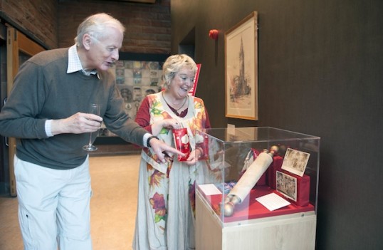 EPT's Gordon Braidwood and Irene Beaver examine CHT’s exhibition, showcasing memorabilia from performances past. Photo: Jane Barlow 