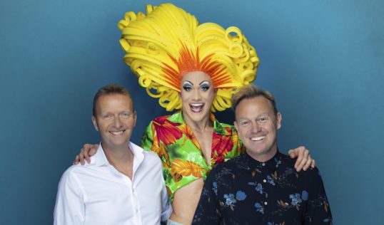 Mark Goucher and Jason Donovan with a big-haired drag queen. Pic: Darren Bell.