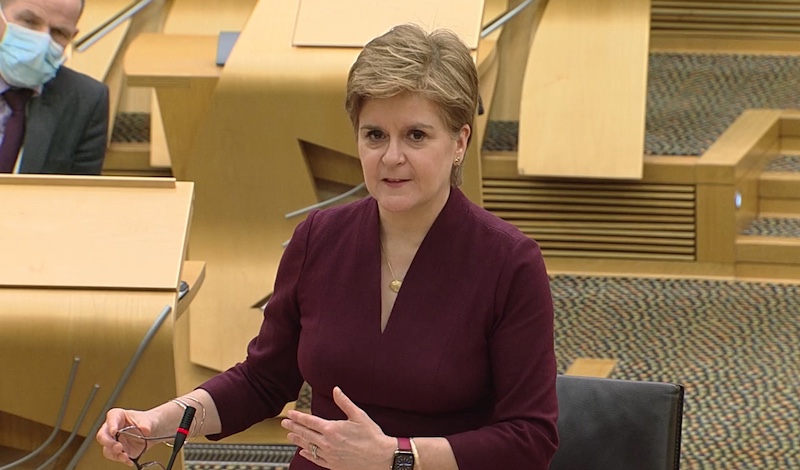 First Minister Nicola Sturgeon announces the easing of restrictions in Holyrood. Screengrab: Æ