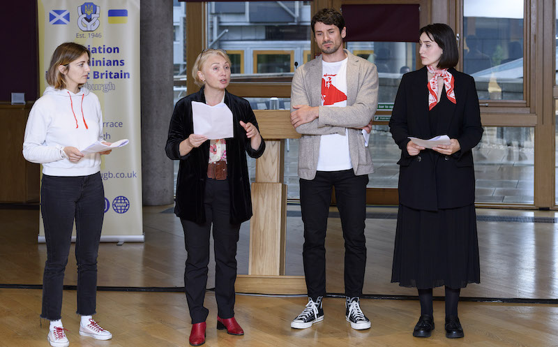 Hanna Komar, Mitya Savelau, Victoria Milham and Nastasya Korablina performing an abridged version of The People Woke Up at the Scottish Parliament. Sept 29 2022
